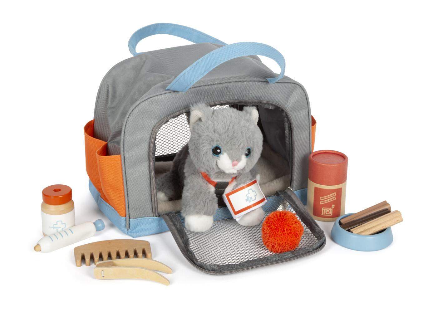 Katze mit Tasche und Pflege-Set